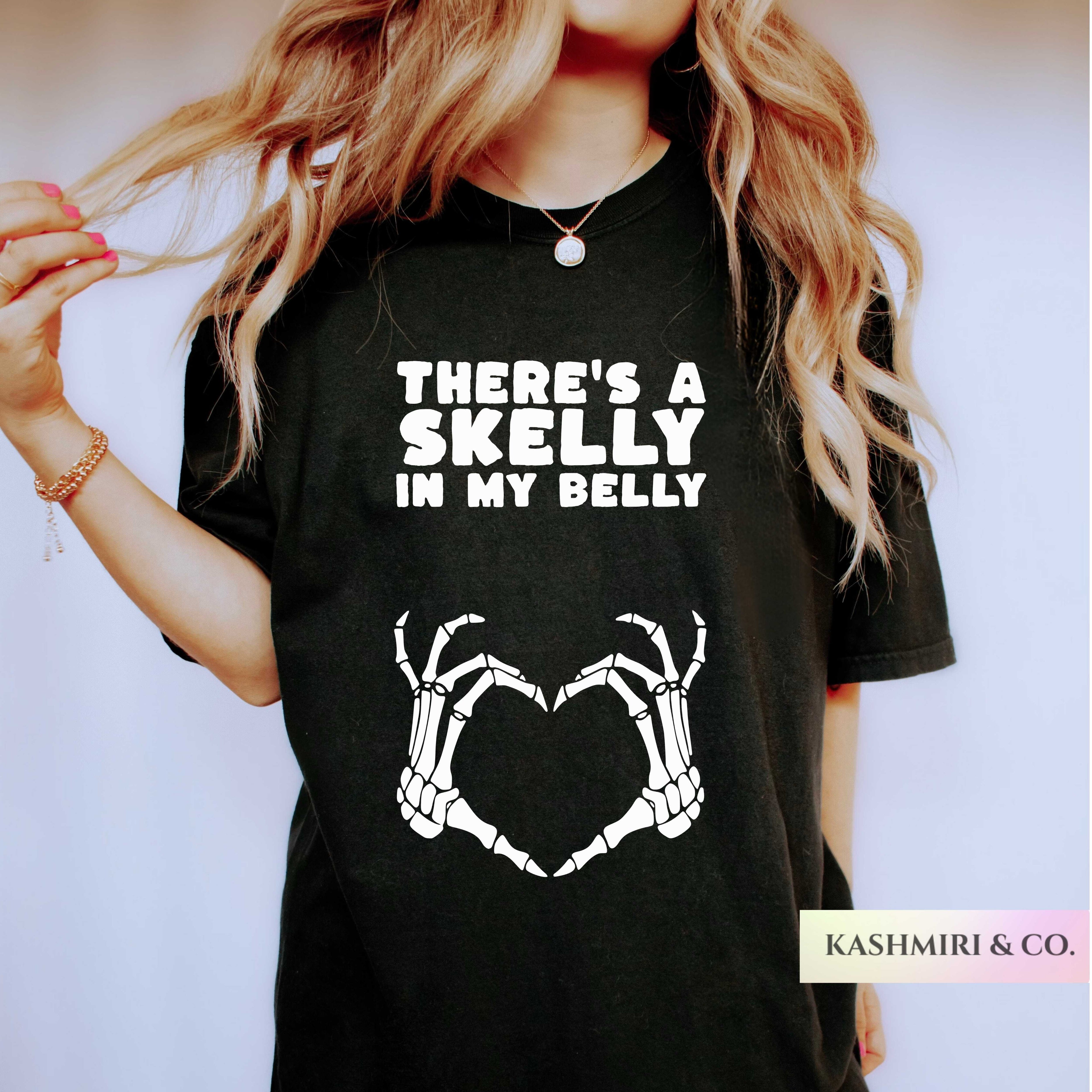 A SKELLY IN MY BELLY PREGNANCY ANNOUNCEMENT TEE