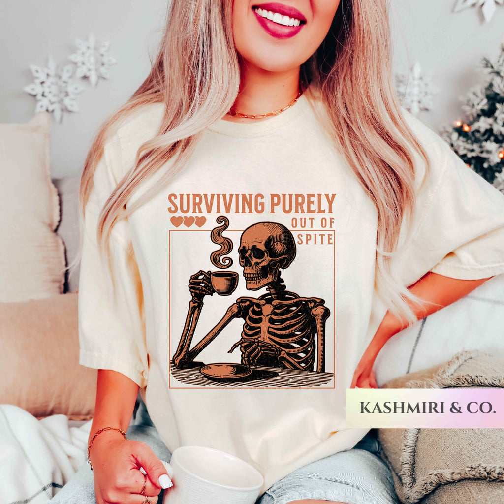 Funny Surviving Purely out of Spite Comfort Colors Shirt, Staying Alive Skeleton Coffee Lover Tee, Halloween Gothic Boho Skull T-Shirt Fall
