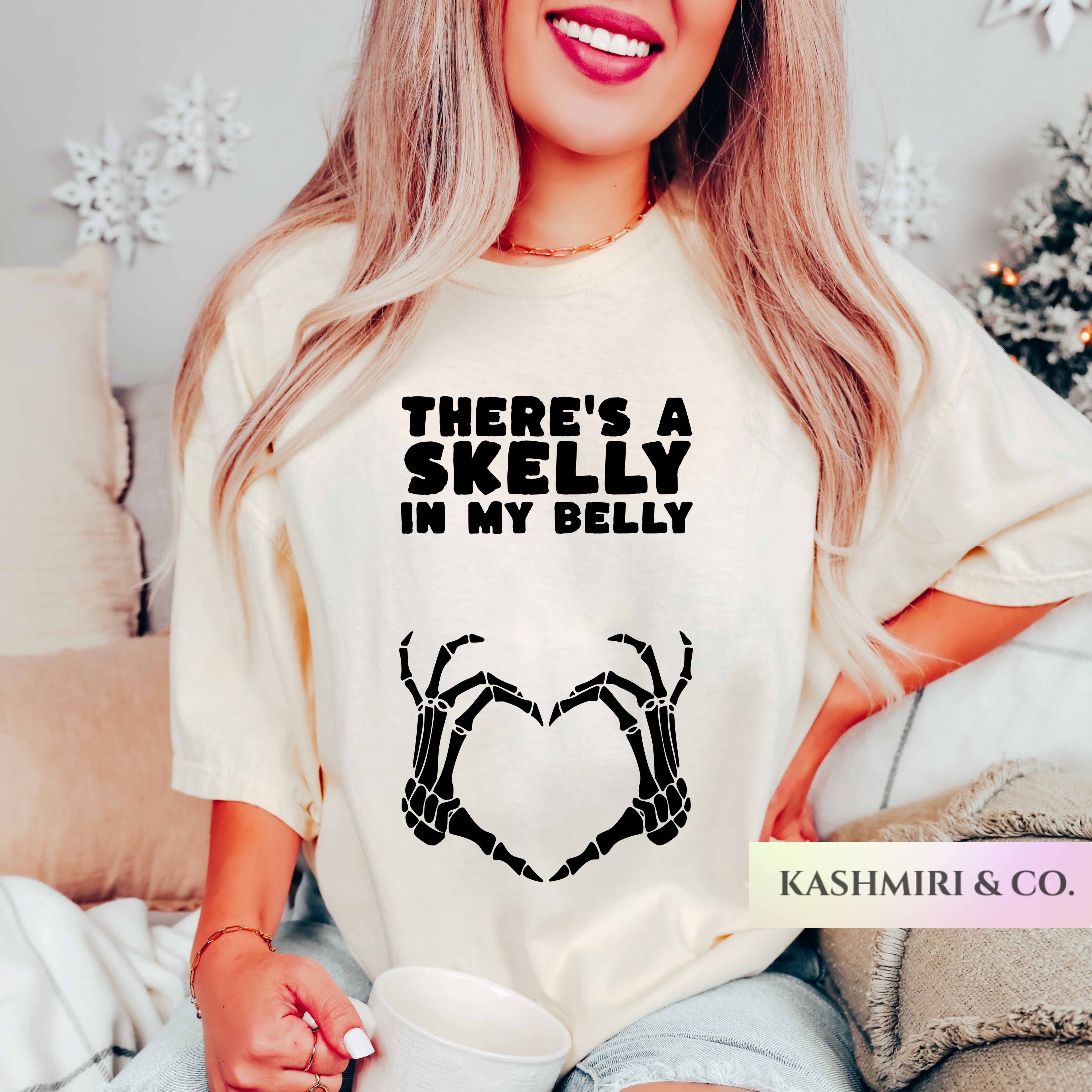 A SKELLY IN MY BELLY PREGNANCY ANNOUNCEMENT TEE