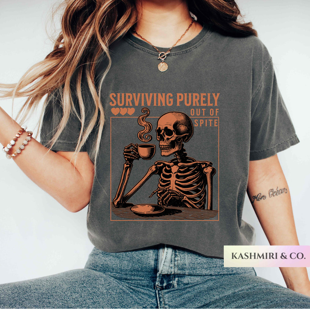Funny Surviving Purely out of Spite Comfort Colors Shirt, Staying Alive Skeleton Coffee Lover Tee, Halloween Gothic Boho Skull T-Shirt Fall